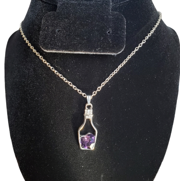 Jewelry - Purple crystal love drift pendant necklace